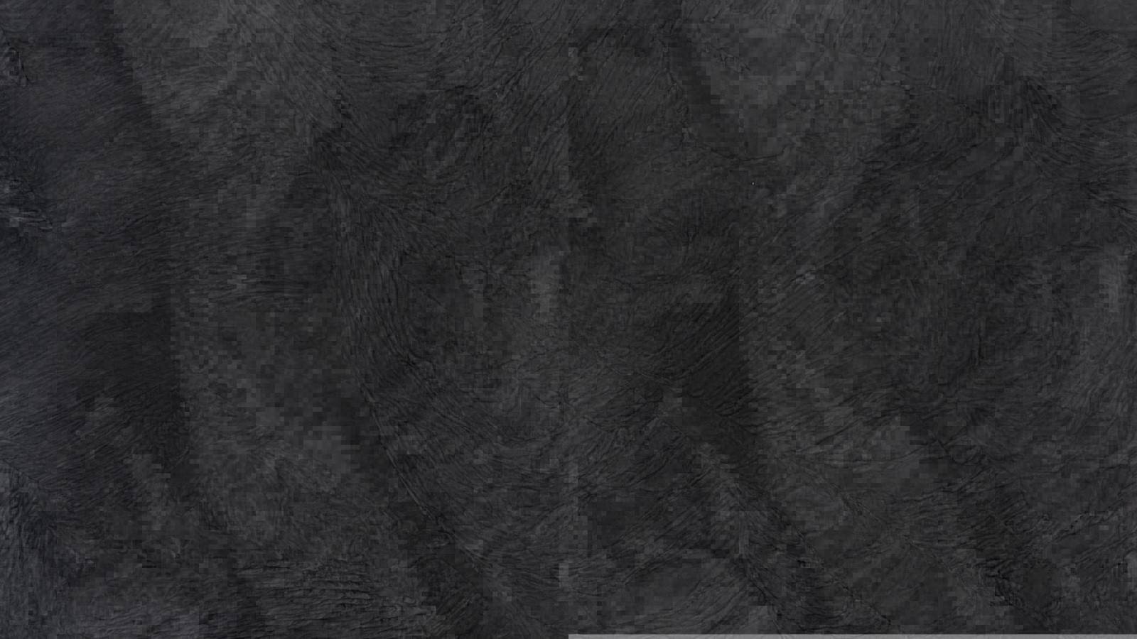 Plan de travail en granit noir et gris brillant pour votre cuisine rustique en aquitaine